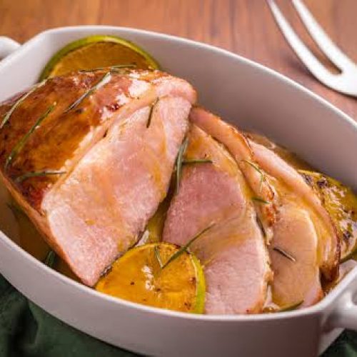 Pernil suíno assado ao molho de laranja